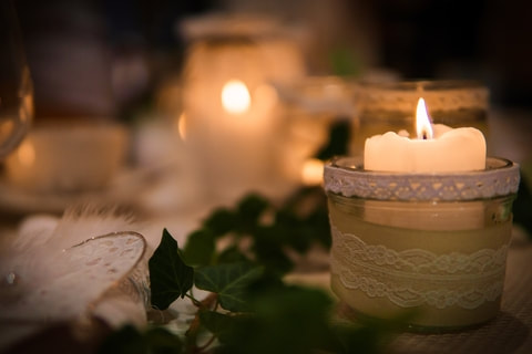 Candlelight and wedding decorations showing the lighting setting and backdrop